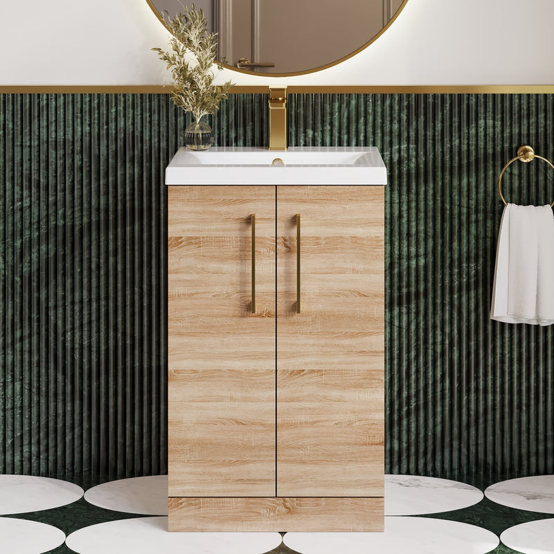 Lana Bleached Oak 500mm floorstanding vanity unit with brushed brass fittings and a green tiled room