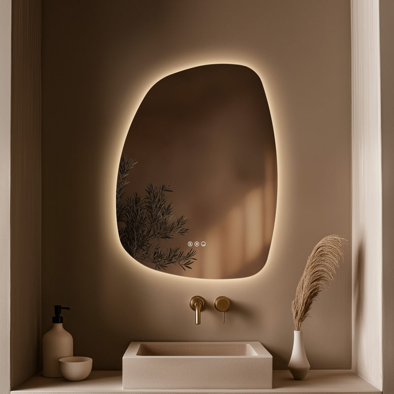 Claris Organic 60 x 80cm LED bathroom mirror with touch sensor and backlit frame, styled in a warm neutral bathroom with brushed brass tap and modern basin - Origins Living mirror at BathLab