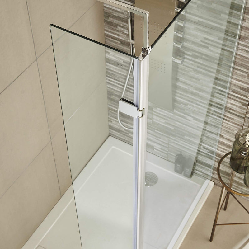 Vista 8mm chrome walk in shower screen on a white walk in shower tray with optional deflector panel